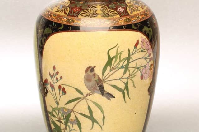 This Oriental cloisonné vase sold for £6,000.