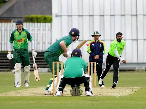 Harrogate CC's Sri Lankan all-rounder Ishan Abeysekara sends one down during Bank Holiday Monday's cup clash with Sessay CC. Picture: Gerard Binks