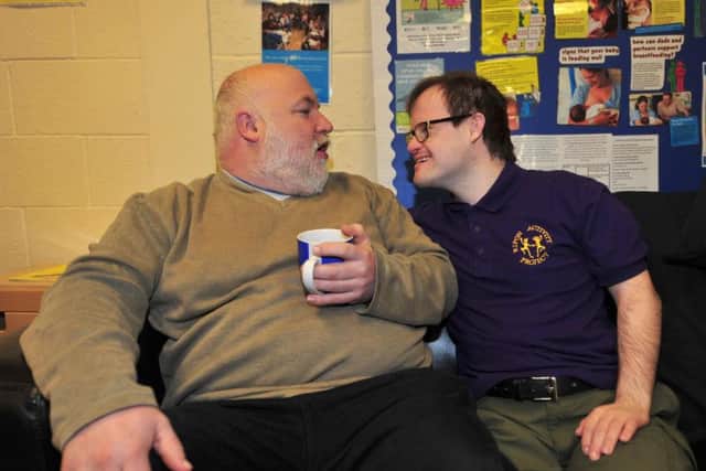 Pictured is Ben Evason chatting with therapist Gary Piddlelonbe. Picture by Gerard Binks.
