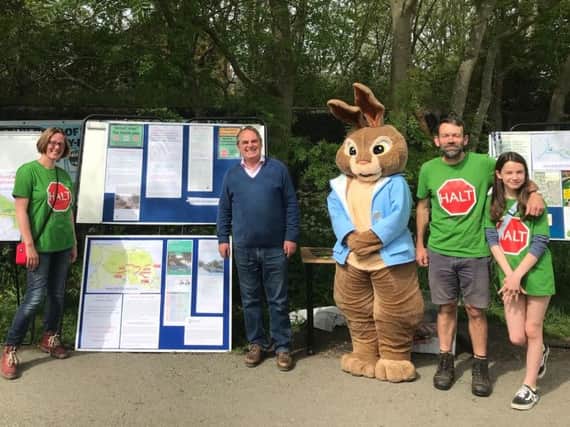 Lord Kirkhope of Harrogate, second from left, at the recent 'sustainable transport' protest walk at Bilton organised by Andrew Jones MP. Also pictured are members of local anti-relief road campaigners HALT.