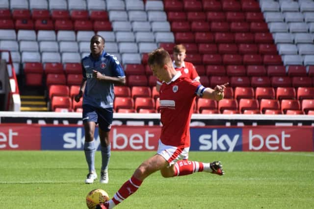 Will Smith in action for Barnsley under-23s.