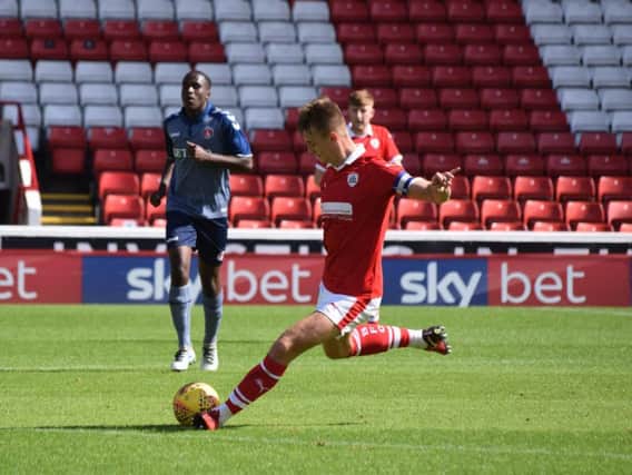 Will Smith in action for Barnsley under-23s.