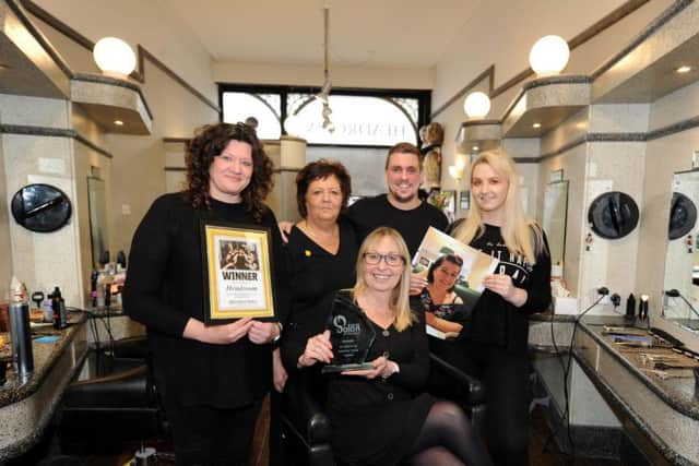 The award-winning salon of the year - Headroom, Oxford Street. Pictured from left: Catherine Little-Barry, Anita Wright, Salon owner Susie Schofield with the award, James Barry, Lisa Wilson (photograph) and Amay Kemp. Picture: Gerard Binks.