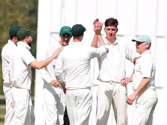 High-flying Follifoot CC celebrate a wicket for Josh Cutts. Picture: Gerard Binks