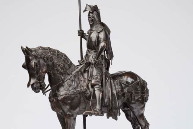 A bronze figure of a knight by Emmanuel Fremiet sold for £3,200.