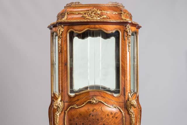 This Louis XV style vitrine sold for £2,900.