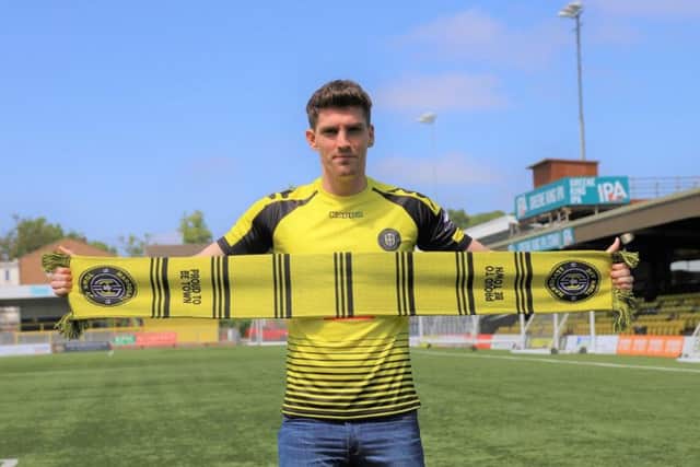 Harrogate Town completed their seventh signing of the summer on Sunday.