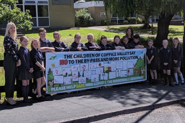 Pupils from Coppice Valley Primary School in Harrogate with their 'Save Nidd Gorge' banner.