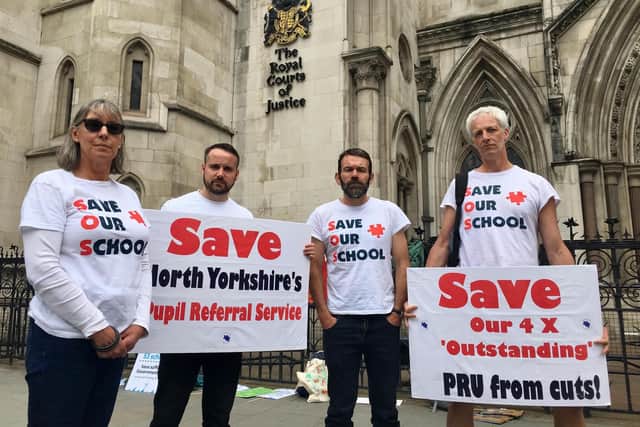 Grove teachers Kate Kersey, Alex Boyce, Chris Kitson and Richard Hughes outside the High Court in London on Wednesday, June 26.