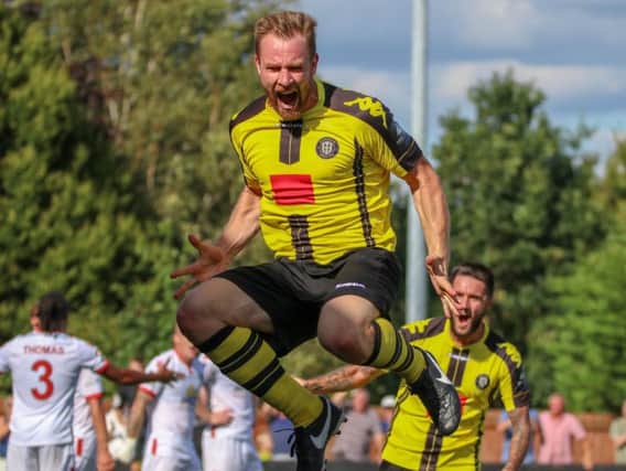 Kelvin Langmead celebrates his late goal against Sutton United on his competitive debut for Harrogate Town. The veteran defender singled out that moment as the highlight of his time in North Yorkshire. Picture: Matt Kirkham