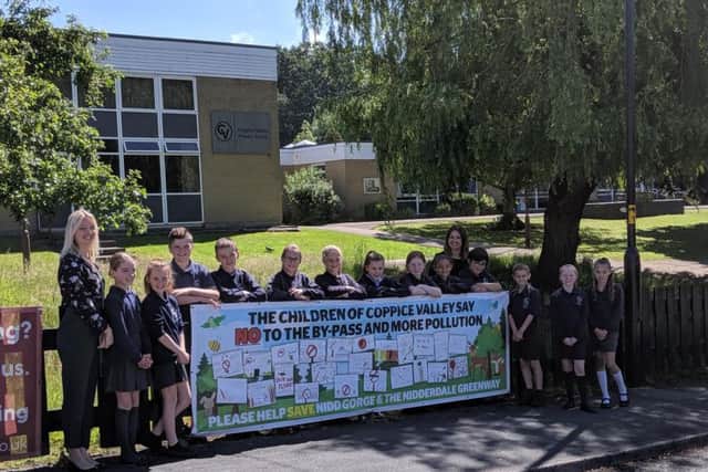 Pupils at Coppice Valley Primary School in Harrogate with their anti-Nidd Gorge relief road protest banner.
