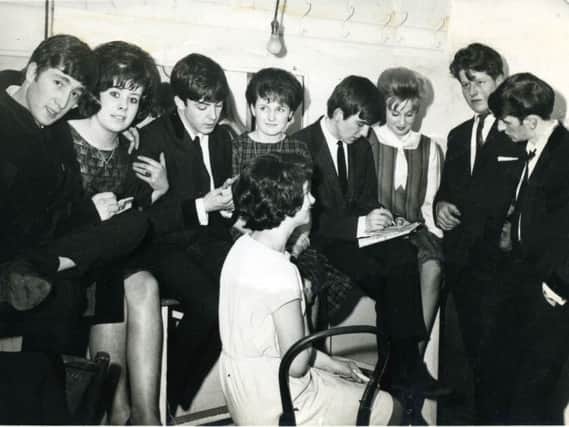 The Beatles pictured back stage with fans at Harrogates Royal Hall in 1963. (Picture by Terry Mason)