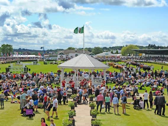 Visitors on the Presidents Lawn, the bandstand and the cattle parade in the main ring at the Great Yorkshire Show. Picture Tony Johnson.