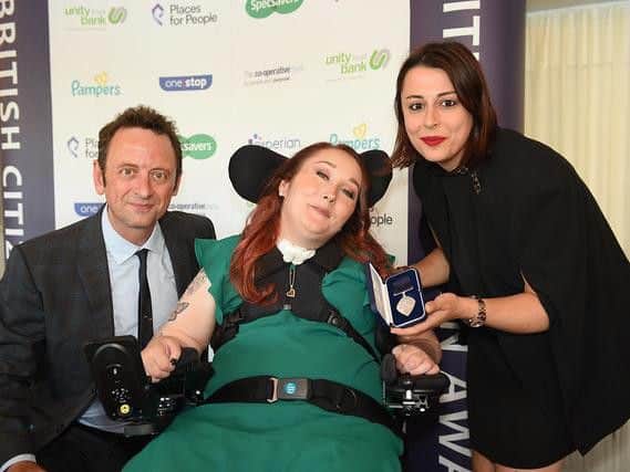 Winner - Lauren Doherty, centre, with her award.