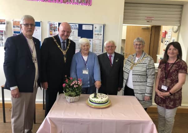 Friends of the cafe Bob and Linda, Mayor Councillor Stuart Martin and his wife April, and volunteers Norman Smales and Karen Tennant.