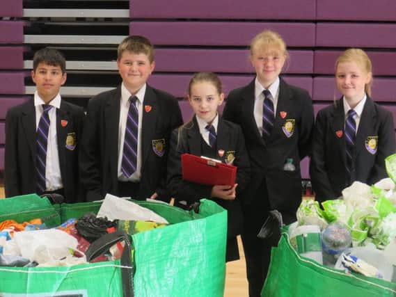 Students have been busily collecting recycled materials to make the project happen.