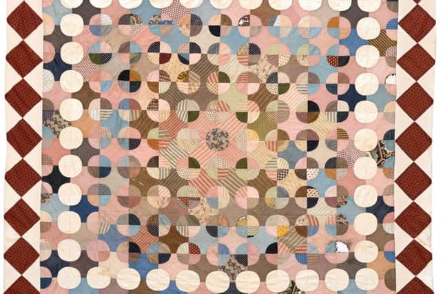 Circa 1810-1820 Patchwork Coverlet, featuring quartered circles known as a jockey hat design - £500-700.