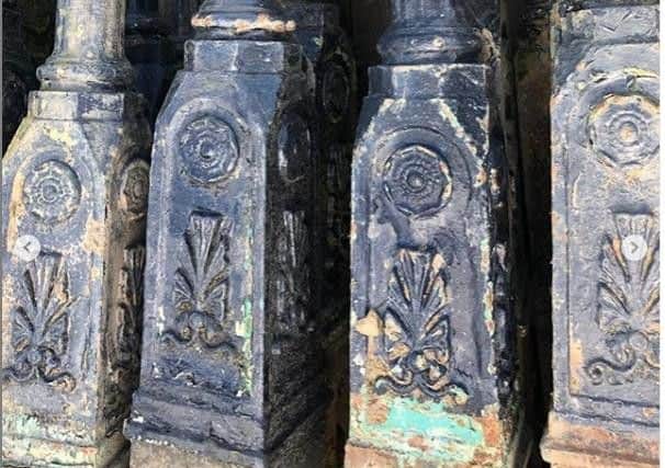 The bases of the Victorian lamp-posts.