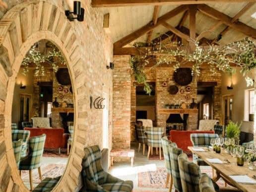 "This smart, stylish pub sits on a picturesque village green. Well-presented dishes have classical roots and showcase local and garden produce." Picture: Michelin Guide.