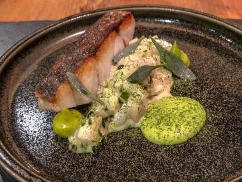 "Exposed bricks and wooden beams give this passionately run, part-13C inn a characterful feel, and two comfy bedrooms complete the picture." Picture: Michelin Guide.