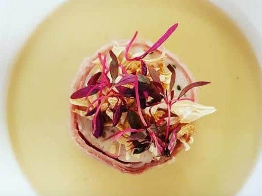 "Bright, modern restaurant within a historic 15C coaching inn; its walls are filled with artwork for sale and at dinner, the plate becomes the canvas." Picture: Michelin Guide.