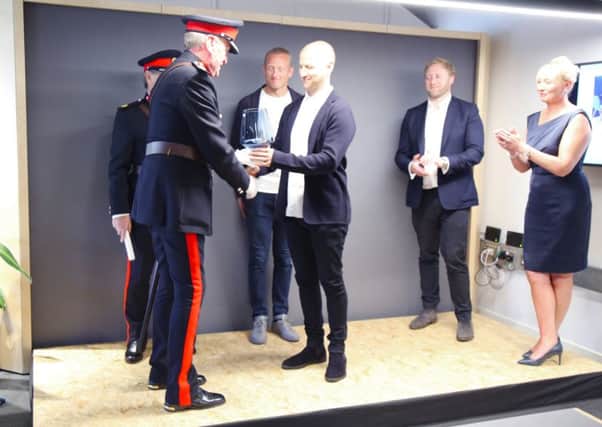 Naughtones Matt Welsh receives the award from David Kerfoot MBE. (S)