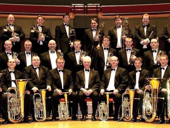 The brass band will play at a fundraiser for Marie Curie