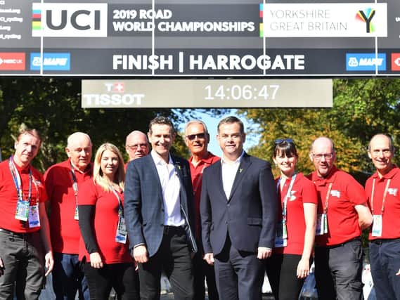 Sports Minister Nigel Adams and Yorkshire2019 CEO Andy Hindley with volunteers in Harrogate at the UCI Road World Championships. Picture: Simon Wilkinson/SWpix.com