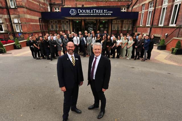 General manager Matthew Hole and staff welcome Harrogate and Knaresborough MP Andrew Jones. PHOTO: Gerard Binks.