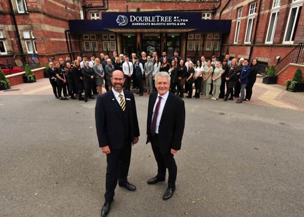 General manager Matthew Hole and staff welcome Harrogate and Knaresborough MP Andrew Jones.      PHOTO: Gerard Binks.