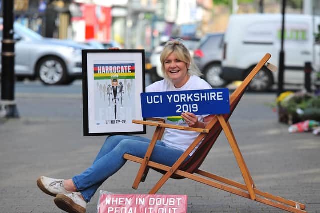 Sophie Hartley of independent Harrogate shop 'Sophie Likes' with UCI cycling merchandise.