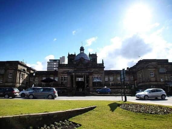 Police and fire crews were called to Harrogate's grand Royal Baths building on Tuesday, after two teenage boys climbed up onto the roof and got stuck trying to take a selfie.