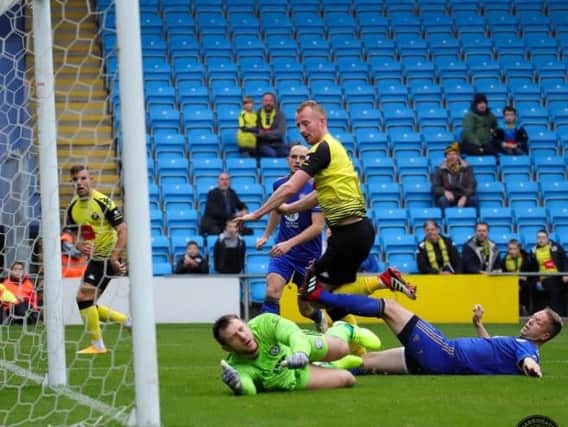 Mark Beck nets his second of the afternoon in Harrogate Town's FA Cup win at FC Halifax Town. Picture: Matt Kirkham