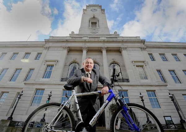 Barnsley councillor Roy Miller is inviting people to donate unwanted bikes