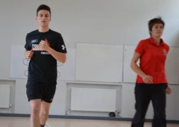 Dan Windham and Hannah Phillips doing the North Yorkshire Police fitness test (s)