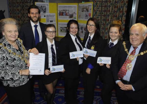 NADV 1409222AM1 Launch of Dementia Friendly Community Initiative. Leah Newell, Claire Poulter, Lauren Jackson and Katherine Poulter of Harrogate High School with their teacher Lee Wilson, The Mayorees of Harrogate Shirley Fawcett and The Mayor of Harrogate Jim Clark. (1409222AM1)