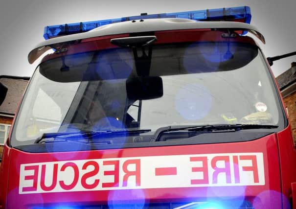 Fire crews rescued four people from the flat