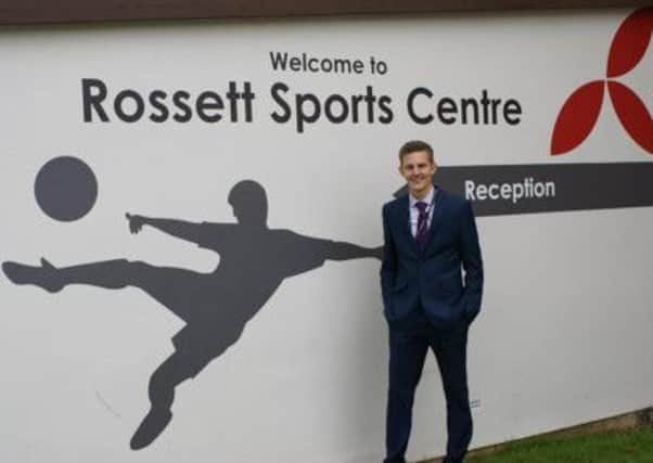 New manager Josh Lyon outside the newly refurbished entrance to Rossett Sports Centre, where he plans to introduce a new, community-friendly programme.