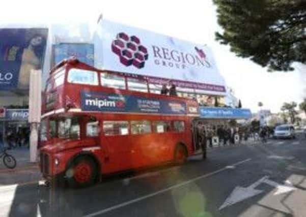 A double-decker bus at the  international MIPIM property event in Cannes in March advertises this weeks MIPIM UK property event in London. (S)