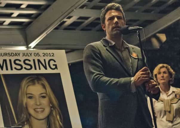 Film Still Handout from Gone Girl, Pictured: Rosamund Pike, Ben Affleck, See PA Feature FILM Reviews, Picture credit should read: PA Photo/Fox UK Film. WARNING: This picture must only be used to accompany PA Feature FILM Reviews.