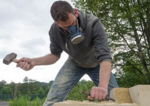 Joseph Hayton working on his project, Pillars Past to be erected in Pateley Bridge as part of a series of art installations along the Way of the Roses Cycle route from Morcame Bay to Bridlington. (Picture by Paul Harris)