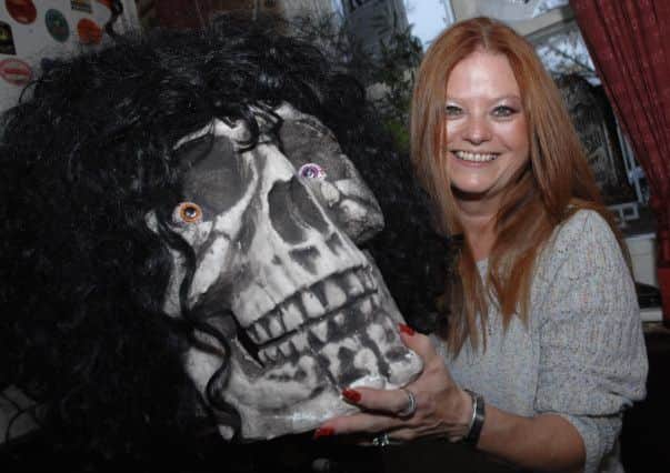 Tap and Spile Halloween. Cherrie Prince who helped with the decorating. (1410285AM5)