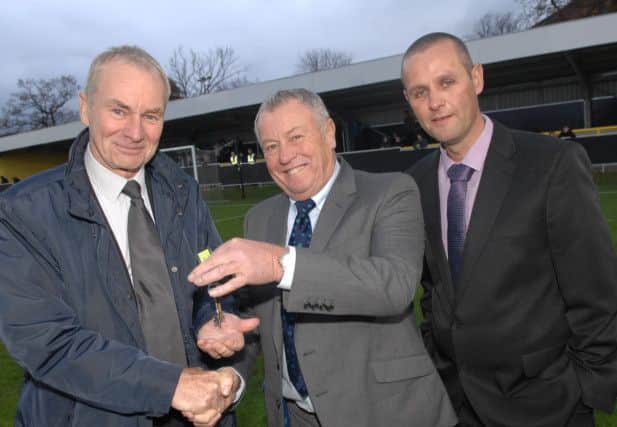 NADV 1411012AM6 Harrogate Town V Stockport. Managing director of SBu Keith Swales and site manager Will Griffin hand over the keys to the new stand to Harrogate Town chairman Irving Weaver. Picture : Adrian Murray. (1411012AM6)