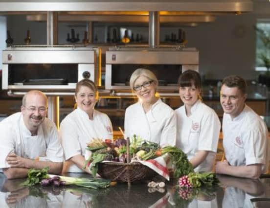 Frances Atkins of The Yorke Arms (centre) with Bettys Cookery School tutors at Bettys Cookery School.