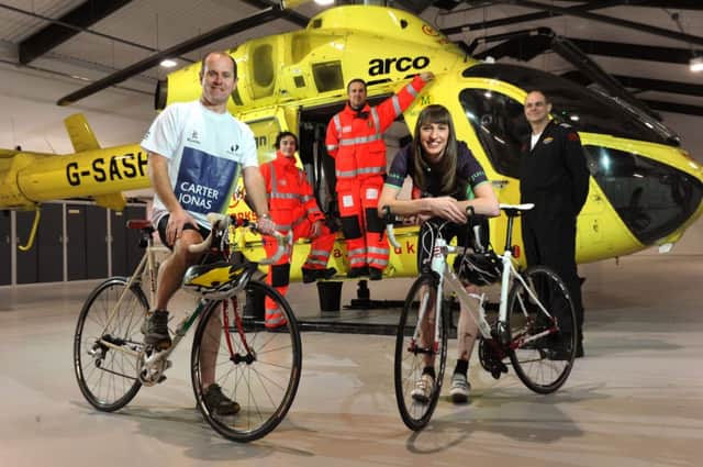 David Boulton and Amy Souter from Carter Jonas with Captain Andy Lister and aircrew paramedics Leon Baranowski and Darrel Cullen prepare for the 2015 Yorkshire Pedalthon. (S)
