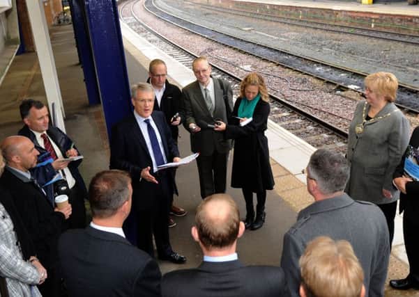 11/10/13   Andrew Jones MP (centre) speaking at the official launch of Harrogate rail line improvement bid at Harrogate  station yesterday (fri) .