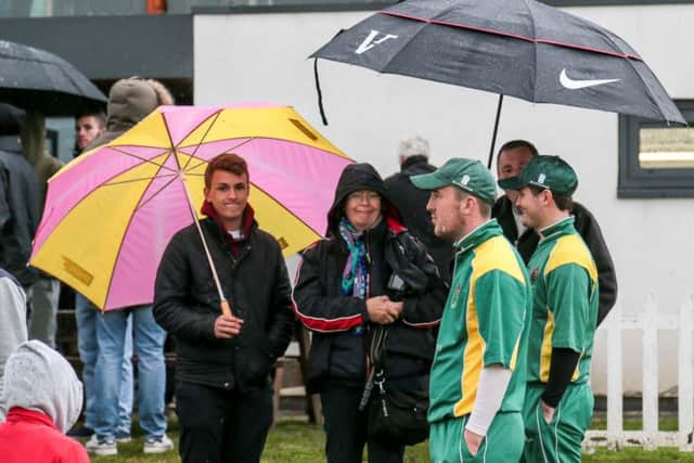 Harrogate captain George Ross watches on as the rain falls (Caught Light Photography)