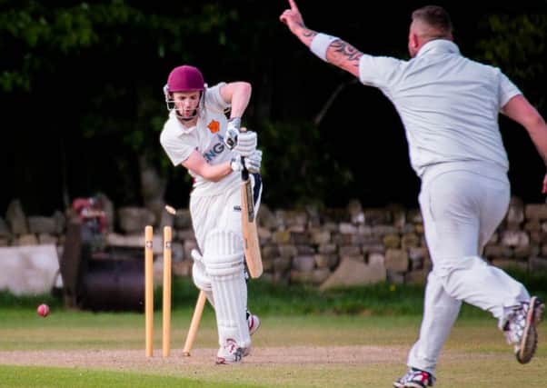 Mike McEnearney bowls Bilton's Michael Donnelly