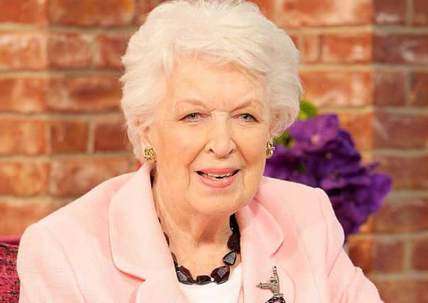 June Whitfield.