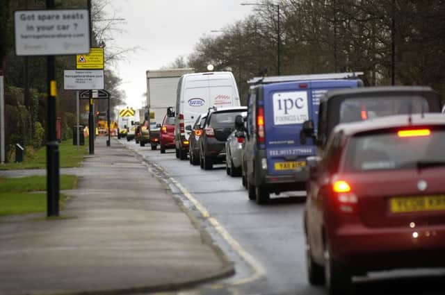 tis Traffic into Harrogate on Leeds Road. (140205M4c)